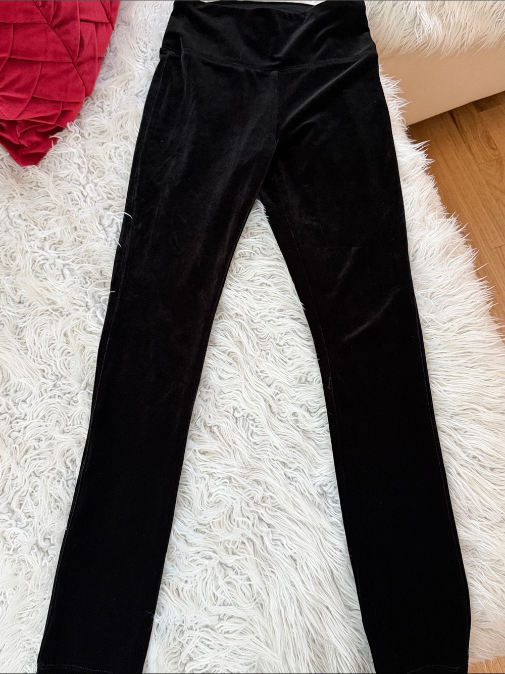 These are White House Black Market black velvet "The Legging" pants in size XSP